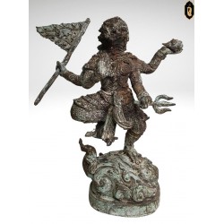 Supporting the rusted bronze devil