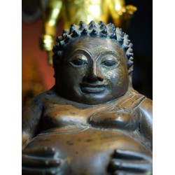 Ancient wooden Sangkajai Buddha image The Rattana era is more than a hundred years old. Very difficult to find It is valuable and worth keeping.