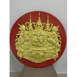 A rare and valuable old royal seal. It is considered a very powerful seal. It used to be a seal at an important place. It is beautiful and powerful. It is made of titanium metal covered with gold on a red wooden background.