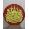 A rare and valuable old royal seal. It is considered a very powerful seal. It used to be a seal at an important place. It is beautiful and powerful. It is made of titanium metal covered with gold on a red wooden background.