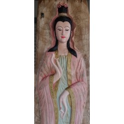 The Bodhisattva Guan Yin carved from golden teak wood, an ancient rice massager over 100 years old, changed by supernatural power, having enough to eat and use, keeping the precepts and the Dharma, leading to a pure mind