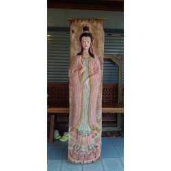 The Bodhisattva Guan Yin carved from golden teak wood, an ancient rice massager over 100 years old, changed by supernatural power, having enough to eat and use, keeping the precepts and the Dharma, leading to a pure mind
